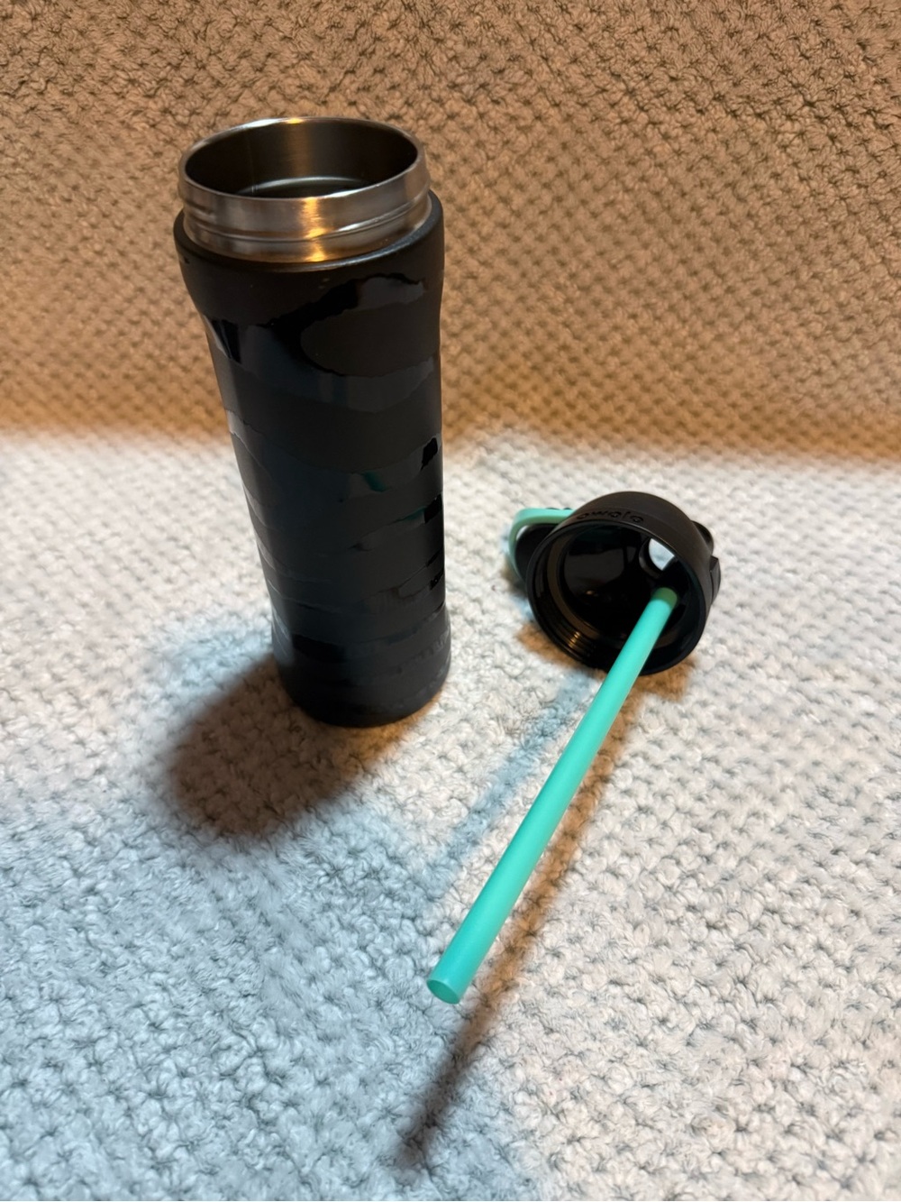 Owala Black Insulated Tumbler with light teal Straw 24 oz